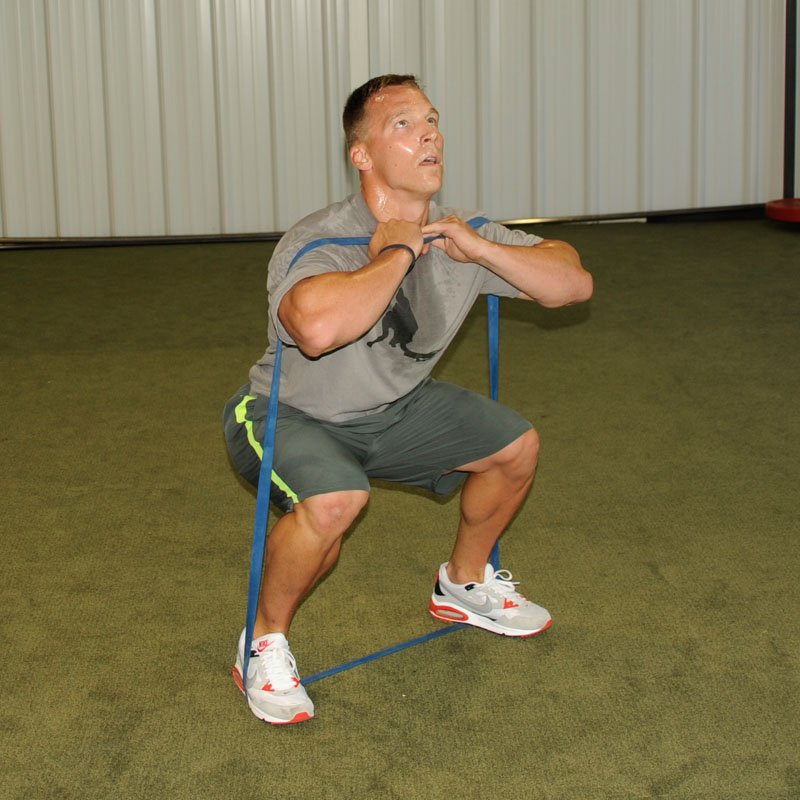 Leg Flexion exercises standing using band (35f) 