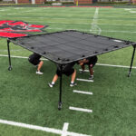 RAE CROWTHER Jam tent with players high angle