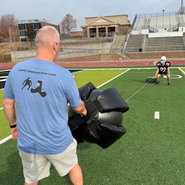 Rae Crowther Sling Ball training tool with stretch tube and 10lb ball for low-impact, fast-moving tackling drills and rip technique practice.